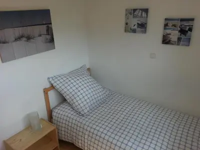 Ein Bett oder Betten in einem Zimmer der Unterkunft Ferienhaus Lisa