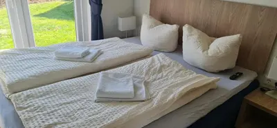 Ein Bett oder Betten in einem Zimmer der Unterkunft Haus Chios