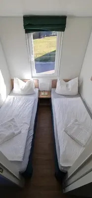 Ein Bett oder Betten in einem Zimmer der Unterkunft Haus Ballum