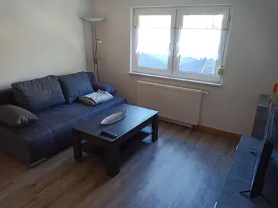 Ein Sitzbereich in der Unterkunft Ferienwohnung Rothen-Adler