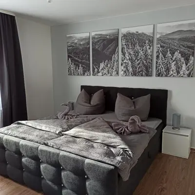Ein Bett oder Betten in einem Zimmer der Unterkunft Zur alten Zeche
