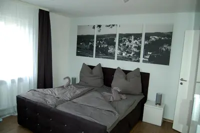 Ein Bett oder Betten in einem Zimmer der Unterkunft Zur alten Zeche