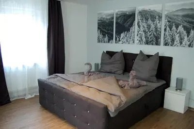 Ein Bett oder Betten in einem Zimmer der Unterkunft Zur alten Zeche