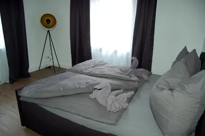 Ein Bett oder Betten in einem Zimmer der Unterkunft Zur alten Zeche