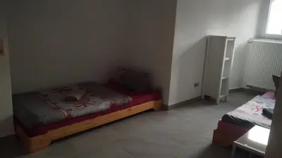 Ein Bett oder Betten in einem Zimmer der Unterkunft Haus Guttenberg