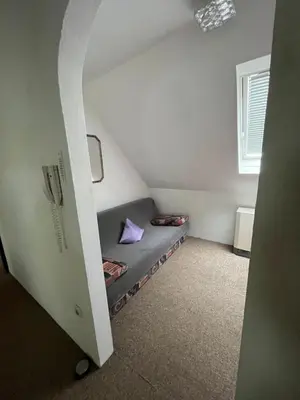 Ein Bett oder Betten in einem Zimmer der Unterkunft Ferienwohnung Schlossberg 3