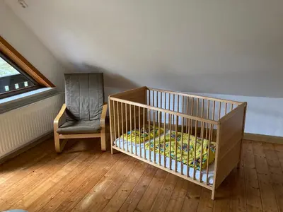 Ein Bett oder Betten in einem Zimmer der Unterkunft Kleines Haus am Waldrand, Haustiere auf Nachfrage