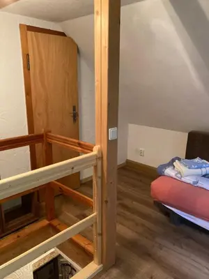 Ein Bett oder Betten in einem Zimmer der Unterkunft Kleines Haus am Waldrand, Haustiere auf Nachfrage