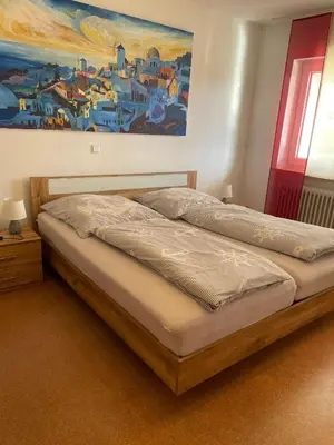 Ein Bett oder Betten in einem Zimmer der Unterkunft Emyda' s Tropical Home at Goldsteig trail