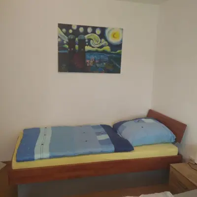 Ein Bett oder Betten in einem Zimmer der Unterkunft Emyda' s Tropical Home at Goldsteig trail