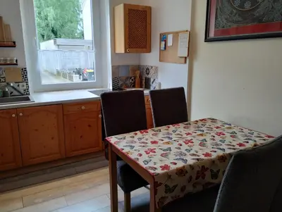 Küche/Küchenzeile in der Unterkunft Ferienwohnung in der Kunst und Kultur Villa Bad Steben