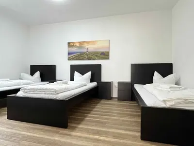Ein Bett oder Betten in einem Zimmer der Unterkunft SAD190 - Zentrale Moderne Monteurwohnungen
