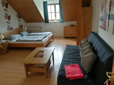 Ein Bett oder Betten in einem Zimmer der Unterkunft Gästehaus Am Sonnenhang