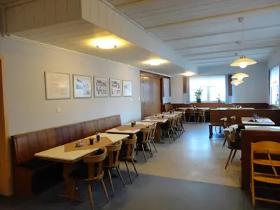 Ein Restaurant oder anderes Speiselokal in der Unterkunft Gasthof Reif