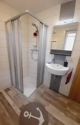 Ein Badezimmer in der Unterkunft Unsere Ferienwohnung in Lengenfeld.