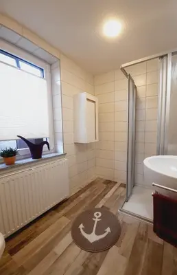 Ein Badezimmer in der Unterkunft Unsere Ferienwohnung in Lengenfeld.