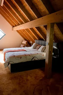 Ein Bett oder Betten in einem Zimmer der Unterkunft All Senses Ferienwohnung