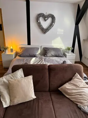 Ein Bett oder Betten in einem Zimmer der Unterkunft komfortable Ferienwohnung am Stadtwald von Plauen