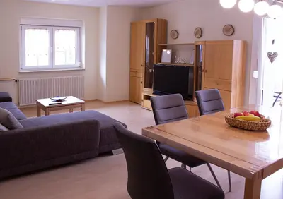 Ein Sitzbereich in der Unterkunft Schöne Ferienwohnung mit großer Terrasse.