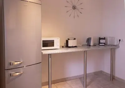 Küche/Küchenzeile in der Unterkunft Schöne Ferienwohnung mit großer Terrasse.