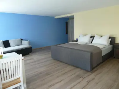 Ein Bett oder Betten in einem Zimmer der Unterkunft Daschner GmbH