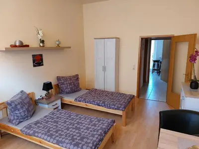 Ein Bett oder Betten in einem Zimmer der Unterkunft Wacker