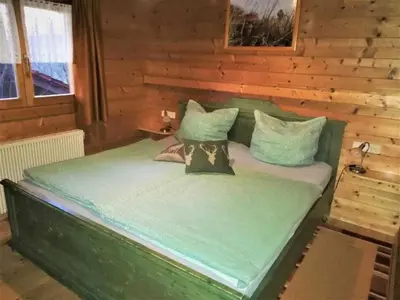 Ein Bett oder Betten in einem Zimmer der Unterkunft Naturerlebnisdorf Stamsried 1
