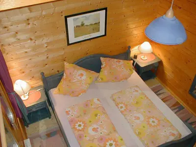 Ein Bett oder Betten in einem Zimmer der Unterkunft Naturerlebnisdorf Stamsried 1