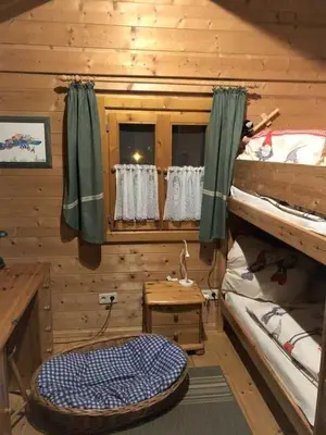 Ein Bett oder Betten in einem Zimmer der Unterkunft Naturerlebnisdorf Stamsried 1