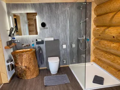 Ein Badezimmer in der Unterkunft Waldstein Chalet