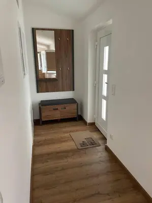 Ein Bett oder Betten in einem Zimmer der Unterkunft Apartment in zentraler Lage mit Privatparkplatz