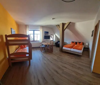 Ein Bett oder Betten in einem Zimmer der Unterkunft Wurzelrudis Hostel