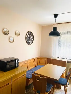 Ein Sitzbereich in der Unterkunft Forsterhof