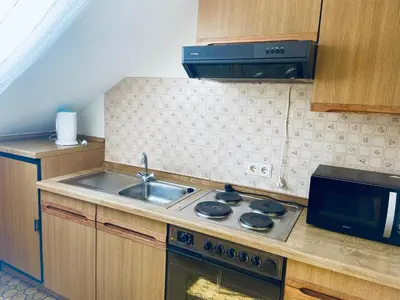 Küche/Küchenzeile in der Unterkunft Forsterhof