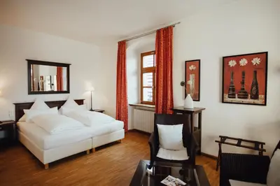 Ein Bett oder Betten in einem Zimmer der Unterkunft Hotel 