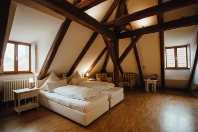 Ein Bett oder Betten in einem Zimmer der Unterkunft Hotel 
