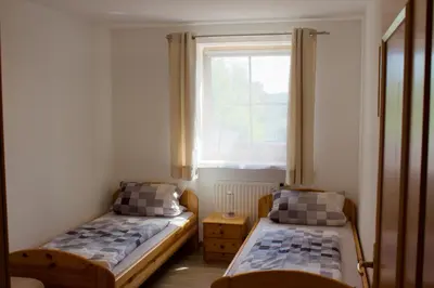Ein Bett oder Betten in einem Zimmer der Unterkunft Ferienwohnungen Seebauer