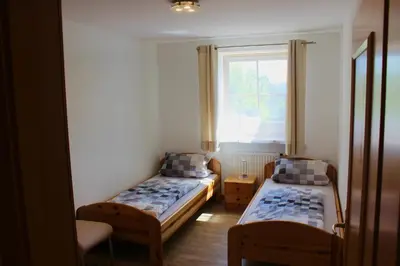 Ein Bett oder Betten in einem Zimmer der Unterkunft Ferienwohnungen Seebauer