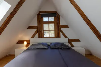 Ein Bett oder Betten in einem Zimmer der Unterkunft Loft auf altem Gutshof ab 2 Nächte