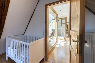 Ein Bett oder Betten in einem Zimmer der Unterkunft Loft auf altem Gutshof ab 2 Nächte