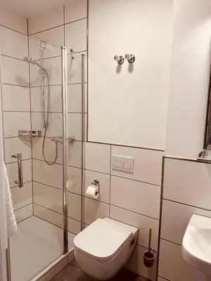 Ein Badezimmer in der Unterkunft Hotel Gaststätte Weinbrücke
