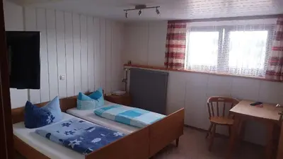 Ein Bett oder Betten in einem Zimmer der Unterkunft Landgasthof Schmidbauer