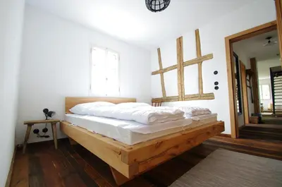Ein Bett oder Betten in einem Zimmer der Unterkunft Ochsenhof