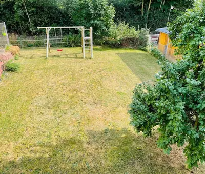 Ein Garten an der Unterkunft Ferienappartement am Almesbach Weiden