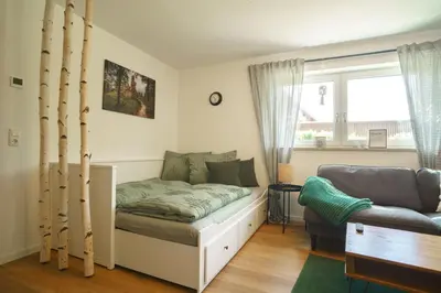 Ein Sitzbereich in der Unterkunft Ferienwohnung Hyggelig