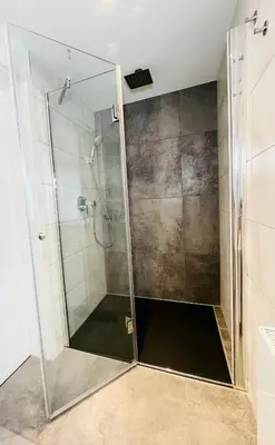 Ein Badezimmer in der Unterkunft FeWo - Bergblick