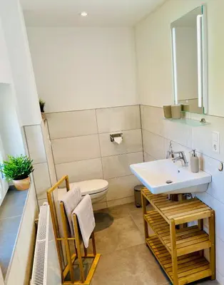 Ein Badezimmer in der Unterkunft FeWo - Bergblick