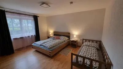 Ein Bett oder Betten in einem Zimmer der Unterkunft Germanus Ferienwohnung