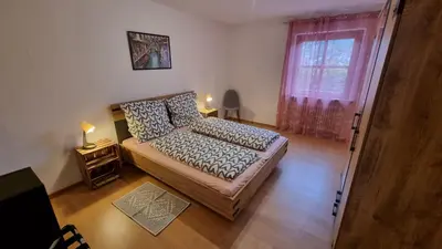 Ein Bett oder Betten in einem Zimmer der Unterkunft Germanus Ferienwohnung