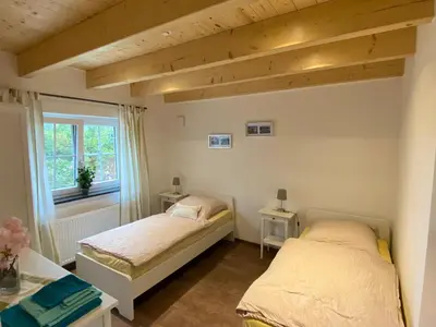 Ein Bett oder Betten in einem Zimmer der Unterkunft Ferienwohnung Leimitz